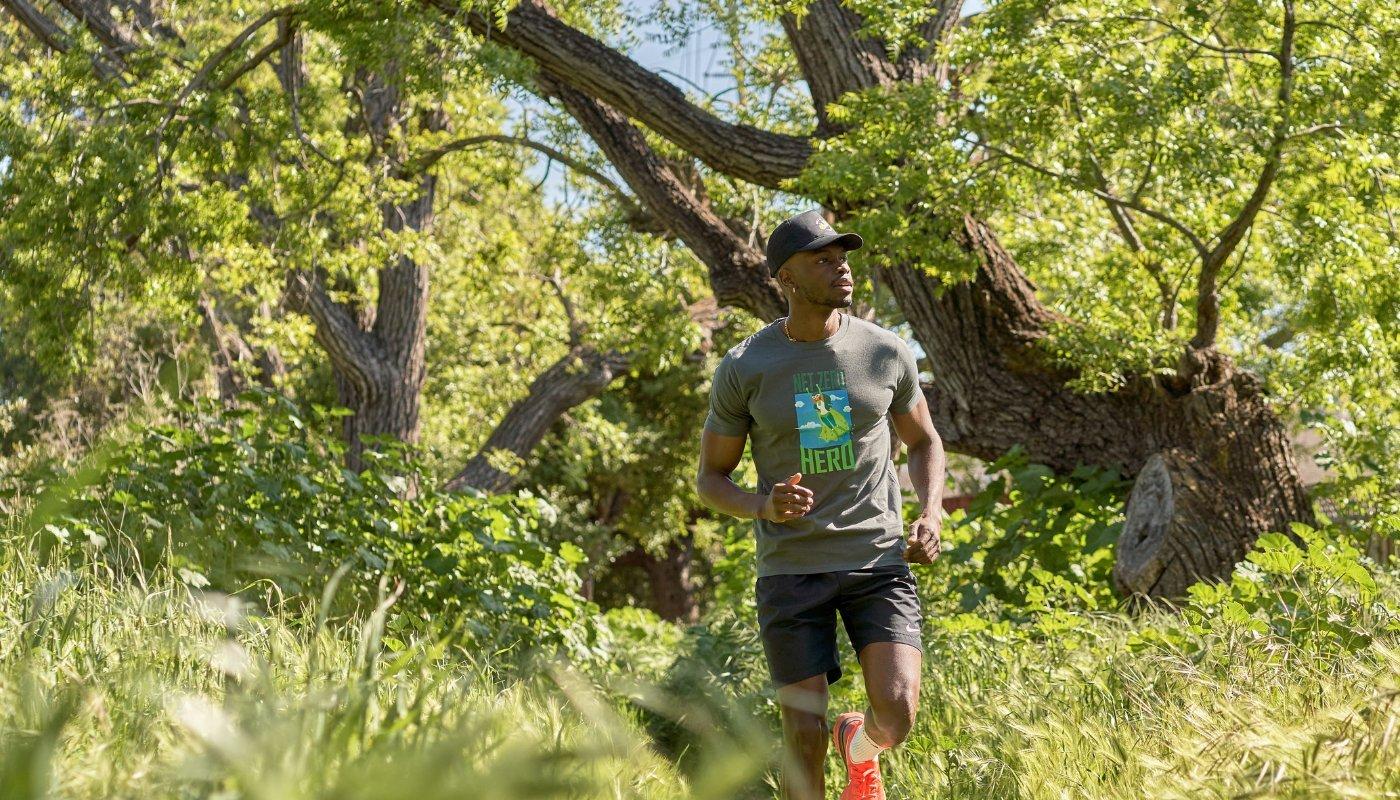 guy outside running wearing a custom t-shirt